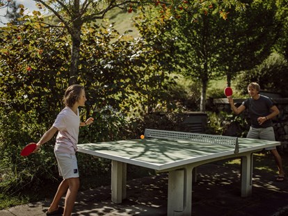 Mountainbike Urlaub - Kinderbetreuung - Tischtennis im Garten - The RESI Apartments "mit Mehrwert"