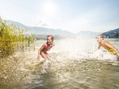 Mountainbike Urlaub - Hunde: erlaubt - Österreich - Badespaß am Millstätter See - Trattlers Hof-Chalets