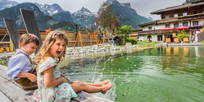 Mountainbike Urlaub - Kinderbetreuung - Österreich - Naturschwimmteich - Familien und Vitalhotel Mühlpointhof ***S