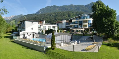 Mountainbike Urlaub - Pools: Außenpool beheizt - Bad Mitterndorf - Hotel mit Gartenansicht - Hartweger' Hotel in Weißenbach bei Schladming