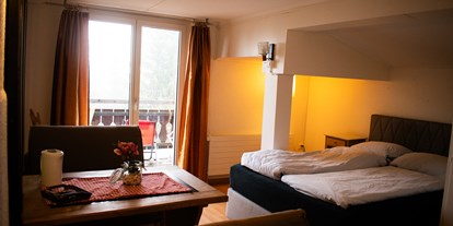 Mountainbike Urlaub - Hotel-Schwerpunkt: Mountainbike & Wandern - Davos Platz - Familienzimmer - Hotel & Restaurant Malixerhof