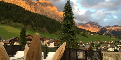 Mountainbike Urlaub - Massagen - Trentino-Südtirol - Dolomites view - Hotel Tofana Explorer's Home