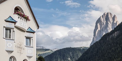 Mountainbike Urlaub - Verpflegung: 3/4 Pension - Südtirol - Ein herrlicher Ausblick auf die Dolomiten. - Alpenheim  Charming Hotel & Spa Hotel