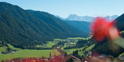 Mountainbike Urlaub - Fahrradwaschplatz - Südtirol - Aussicht auf das Tal und die Dolomiten - Mountain Residence Montana