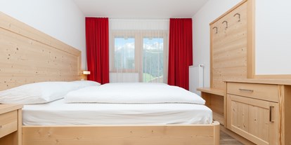 Mountainbike Urlaub - Wellnessbereich - Südtirol - Schlafzimmer - Mountain Residence Montana