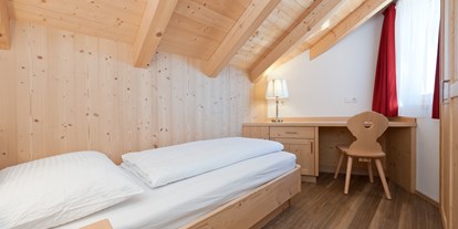 Mountainbike Urlaub - Sauna - Südtirol - Schlafzimmer - Mountain Residence Montana