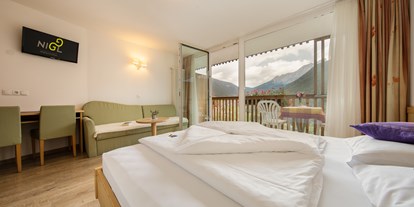 Mountainbike Urlaub - Hotel-Schwerpunkt: Mountainbike & Ruhe - Südtirol - Panoramazimmer Almenrausch - Niggl easygoing Mounthotel