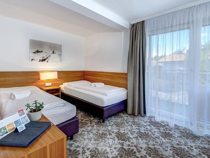 Mountainbike Urlaub - Preisniveau: günstig - Leogang - Kinderschlafzimmer im Familienzimmer - AlpenParks Hotel Maria Alm