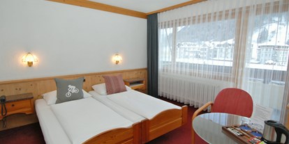 Mountainbike Urlaub - Schweiz - Doppelzimmer auch ohne Teppich möglich - Hotel Crystal Engelberg