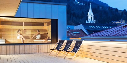 Mountainbike Urlaub - barrierefrei - Schladming - Sauna mit Ausblick auf das wunderbare Dachstein-Massiv.  - Stadthotel Brunner