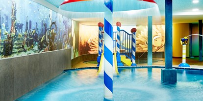 Mountainbike Urlaub - Schwimmen - Welschnofen - Kinder-Erlebnishallenbad 34 °C mit Wasserspielen und Rutsche - Feldhof DolceVita Resort