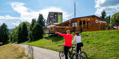 Mountainbike Urlaub - Parkplatz: gebührenpflichtig in Gehweite - Auch gemütliche Mountainbike-Strecken stehen zur Auswahl.  - AHORN Hotel Am Fichtelberg 