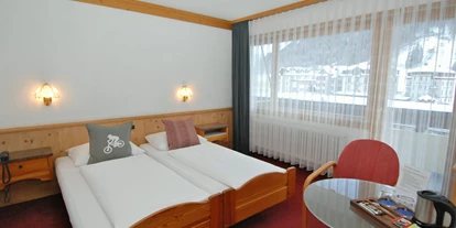 Mountainbike Urlaub - Hotel-Schwerpunkt: Mountainbike & Wellness - Grindelwald - Doppelzimmer auch ohne Teppich möglich - Hotel Crystal Engelberg