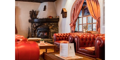 Mountainbike Urlaub - Zermatt - Le salon cheminée, convivial et familial, avec jeux de société à disposition - Hôtel-Restaurant Le Mont-Paisible ***