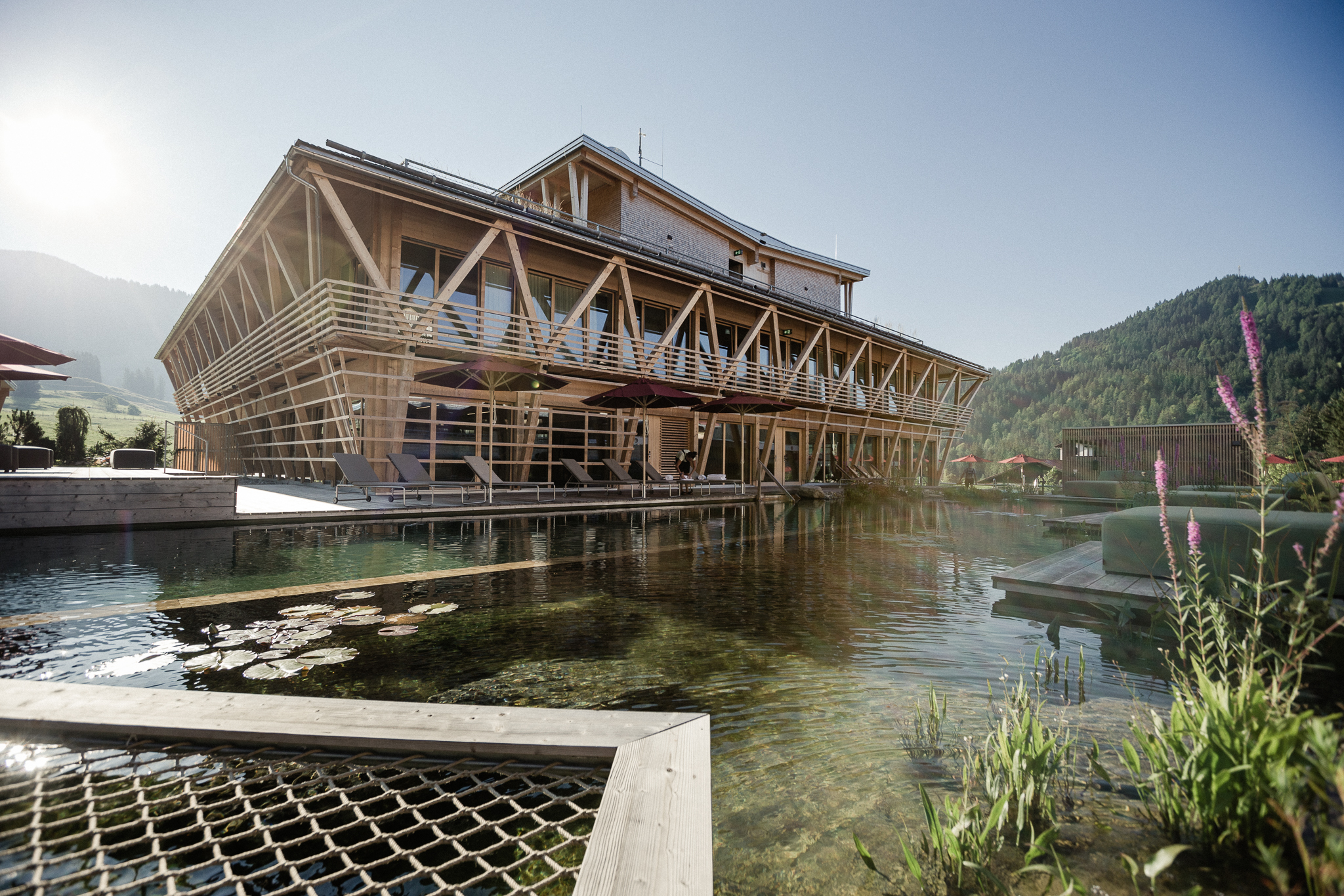 Mountainbikehotel - Wellnessbereich Mountain Spring Spa mit NaturBadeSee - HUBERTUS Mountain Refugio Allgäu