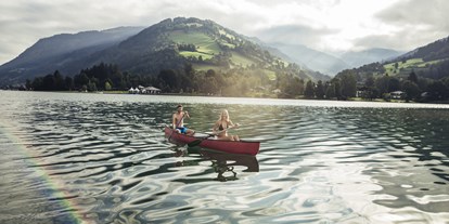 Mountainbike Urlaub - Schwimmen - Paßthurn - Bootsfahrt am Zeller See - Hotel Sonnblick