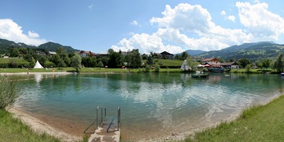 Mountainbike Urlaub - Pools: Außenpool beheizt - Steiermark - Naturbadesee direkt beim Hotel - Sport- & Familienhotel Bärenwirt
