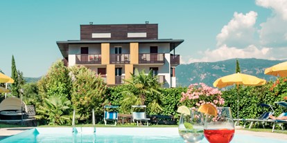 Mountainbike Urlaub - Schwimmen - Brusago di Piné - Outdoor-Pool zum Relaxen - Hotel Traminerhof