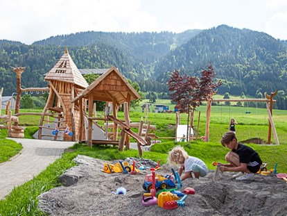 Mountainbike Urlaub - Garten - Abenteuerspielplatz - Alpen Hotel Post