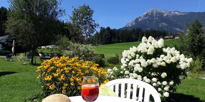 Mountainbike Urlaub - Verpflegung: Frühstück - Haiden (Bad Ischl) - Auszeit im idyllischen Hotelgarten  - Landhotel Häuserl im Wald 