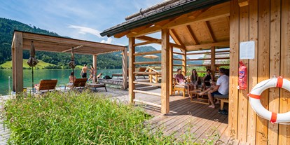 Mountainbike Urlaub - Sauna - Österreich - Badesteg mit Badehaus. Unter sich sein. - Im Franzerl am Weissensee
