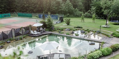 Mountainbike Urlaub - Hotel-Schwerpunkt: Mountainbike & Ruhe - Kitzbühel - Naturbadeteich incl. Kneippbecken - Naturhotel Schütterbad