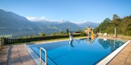 Mountainbike Urlaub - Hotel-Schwerpunkt: Mountainbike & Schwimmen - Outdoorpool in nawu´s Garten - nawu apartments