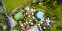Mountainbike Urlaub - Pools: Innenpool - The RESI Apartments "mit Mehrwert"
Garten mit Pools, Schwimmteich Ballsportplatz... - The RESI Apartments "mit Mehrwert"
