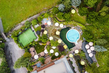 Mountainbikehotel: Garten mit Pools, Schwimmteich Ballsportplatz... - The RESI Apartments "mit Mehrwert"