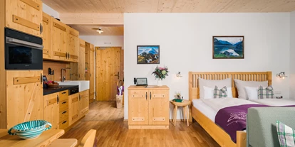 Mountainbike Urlaub - Umgebungsschwerpunkt: See - Wohn- und Schlafraum im Apartment Tuba - Narzissendorf Zloam - Grundlsee