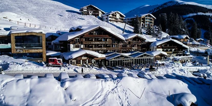 Mountainbike Urlaub - Ellmau - Außenansicht | Winter - MY ALPENWELT Resort****SUPERIOR