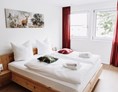 Mountainbikehotel: Schlafzimmer mit Doppelbett im Clemensberg Apartment  - My Lodge Winterberg