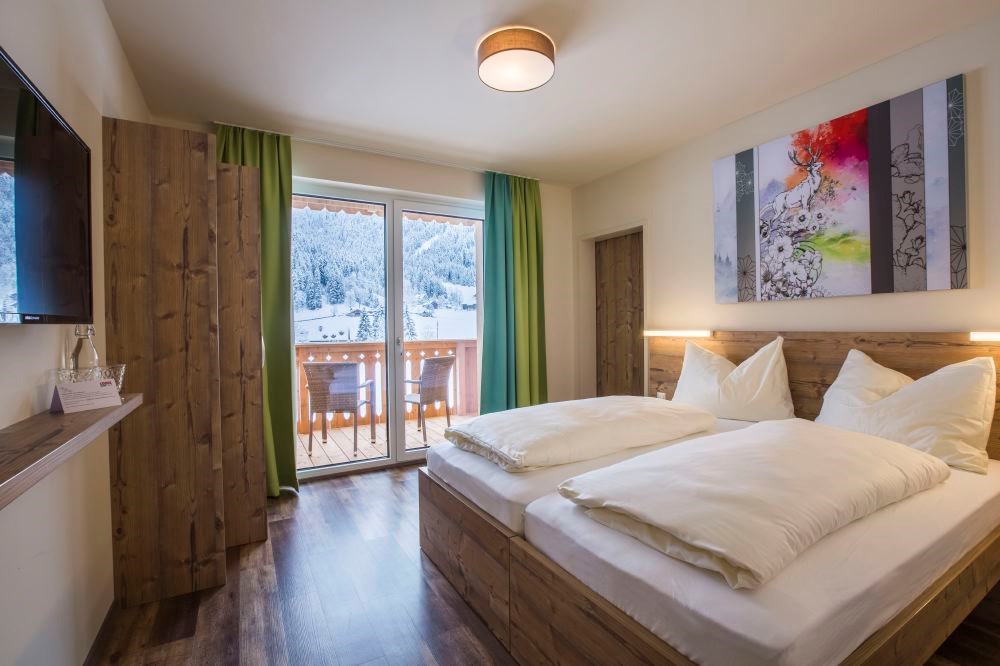 COOEE alpin Hotel Dachstein Zimmerkategorien Gosaukamm Zimmer
