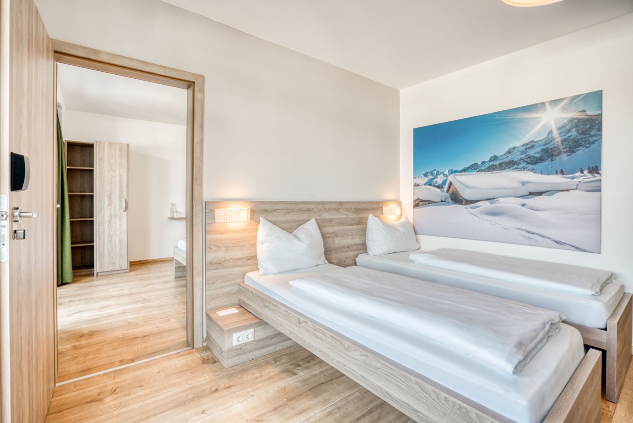 COOEE alpin Hotel Kitzbüheler Alpen Zimmerkategorien Familienzimmer