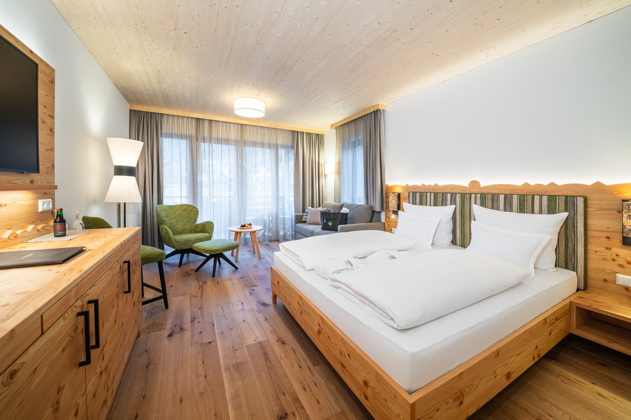 Hotel GUT Trattlerhof & Chalets****S Zimmerkategorien Deluxe Familienzimmer Gutshof (NEU)