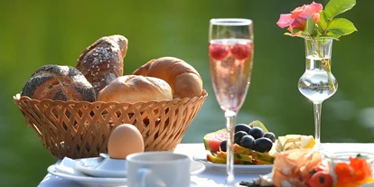 Mountainbike Urlaub - Ellmau - Restaurant S'Körberl: Sonnenterrasse - Familien und Vitalhotel Mühlpointhof ***S