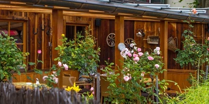 Mountainbike Urlaub - Ellmau - Restaurant S'Körberl: Sonnenterrasse - Familien und Vitalhotel Mühlpointhof ***S