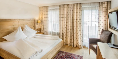 Mountainbike Urlaub - Ellmau - Kuschelzimmer für 2 Erwachsene - Familien und Vitalhotel Mühlpointhof ***S
