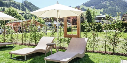 Mountainbike Urlaub - Hotel-Schwerpunkt: Mountainbike & Wandern - Liegewiese mit freiem Bergblick, 3 Minuten ins Zentrum - Rosentalerhof Hotel & Appartements