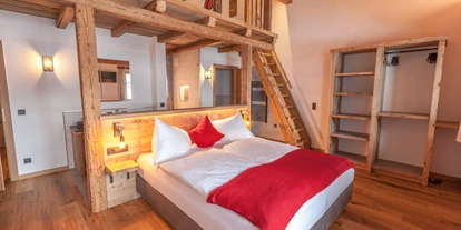 Mountainbike Urlaub - Ellmau - Zimmer mit offenem Badezimmer und Juchee
im Chalet Sepp - Chalets Marolden