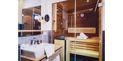 Mountainbike Urlaub - Ellmau - Bathroom with Sauna - Stockinggut by AvenidA | Hotel & Residences
