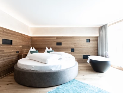 Mountainbike Urlaub - Haustrail - Trentino-Südtirol - Romantiksuite Curuna - Aktiv und Wellnesshotel Traube Post
