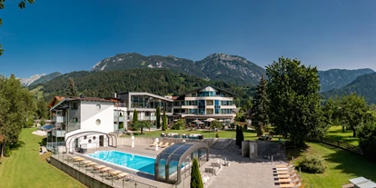 Mountainbike Urlaub - PLZ 8982 (Österreich) - Unser Hotel mit der Hotelanlage - Hartweger' Hotel in Weißenbach bei Schladming