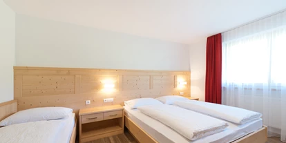 Mountainbike Urlaub - Haustrail - Trentino-Südtirol - Schlafzimmer - Mountain Residence Montana