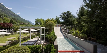 Mountainbike Urlaub - Südtirol - Breitwasserrutsche im Garten - Feldhof DolceVita Resort