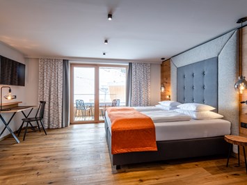 Hotel ZWÖLFERHAUS Zimmerkategorien Junior-Suite Bergzeit 