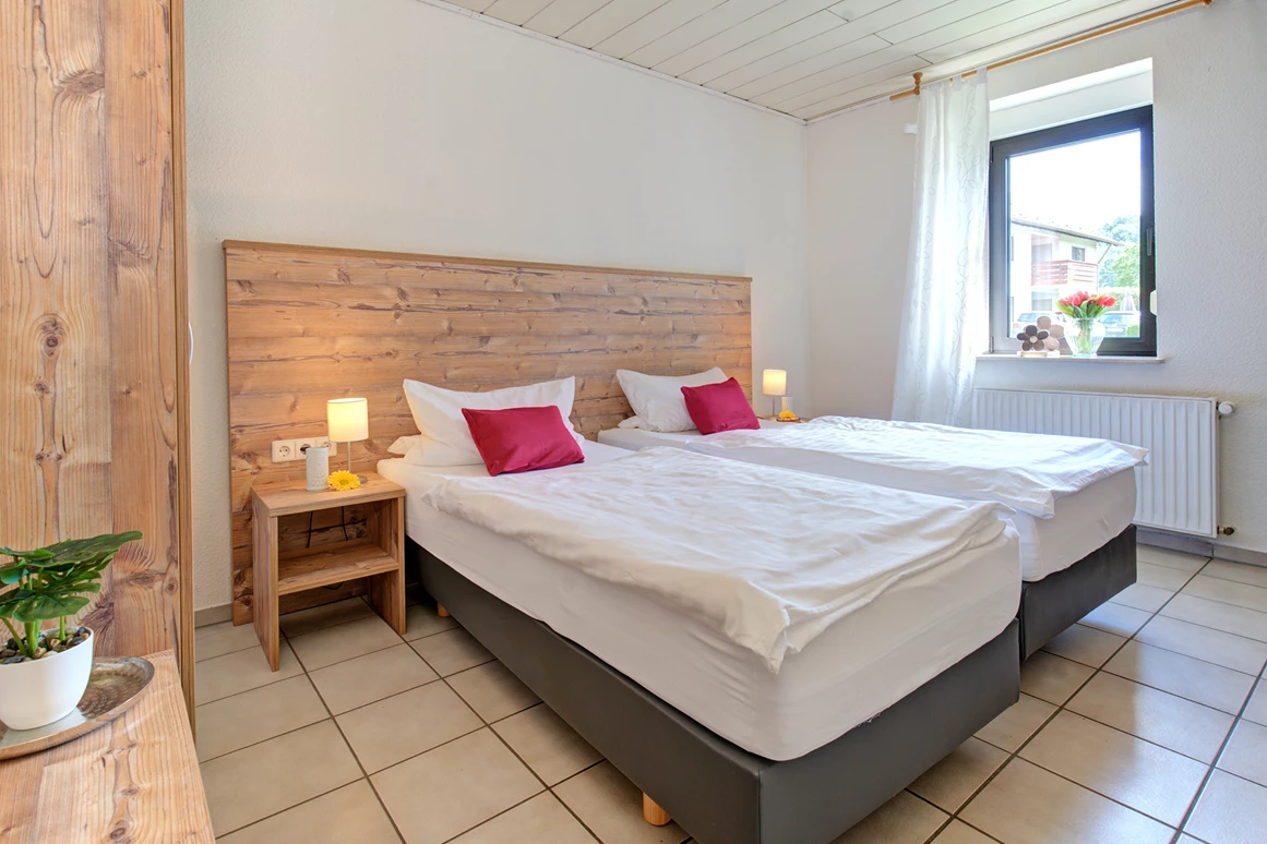 Mountainbikehotel: Ferienhaus Schlafzimmer1 - Apartment & Landhotel Zum Storchennest