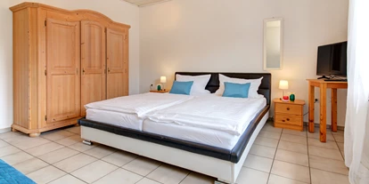 Mountainbike Urlaub - Saarbrücken - Ferienhaus Schlafzimmer3 - Apartment & Landhotel Zum Storchennest