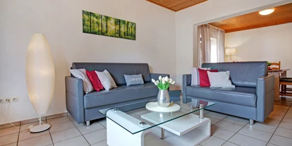 Mountainbike Urlaub - Saarbrücken - Ferienhaus Wohnzimmer - Apartment & Landhotel Zum Storchennest