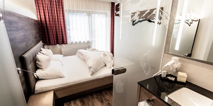 Mountainbike Urlaub - Ellmau - Schlafzimmer Appartement - Aktivhotel Tuxerhof KG